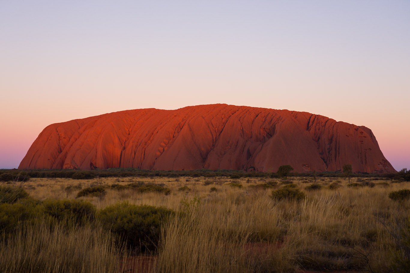 Uluru bij zonsondergang